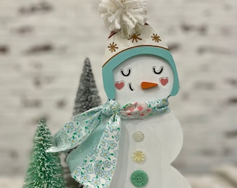 Snowgal with vintage buttons and scarf