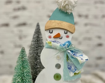 Snowgal with vintage buttons and scarf