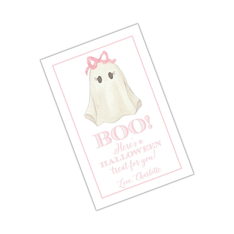 May include: Pink and white Halloween treat bag with a ghost wearing a pink bow and the text "BOO! Here's a HALLOWEEN treat for you! Love, Charlotte".