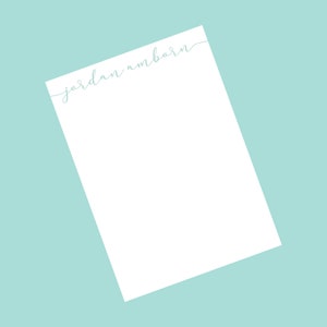 Puede incluir: Una hoja de papel blanca con el texto "jordan amborn" escrito en cursiva en la parte superior.