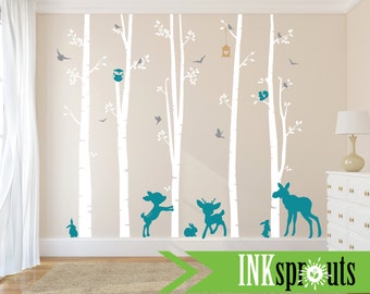 May include: White birch tree wall decals featuring teal deer, moose, and rabbit silhouettes. The decals also include birds, an owl, and a birdhouse.