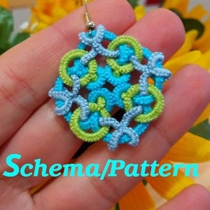 May include: A pair of handmade earrings with a blue and green crocheted design. The earrings are hanging from silver hooks. The text "Le cose della Anto Schema/Pattern" is visible in the image.