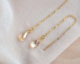 Orecchini pendenti a filo briolette color champagne · Orecchini a catena in acciaio inossidabile dorato · Gioielli dorati con cristalli