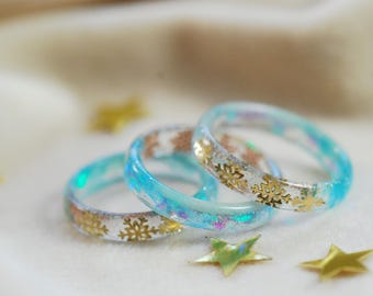 Snowflake blue resin ring, Glow in the dark thin band, Unique iridescent jewelry