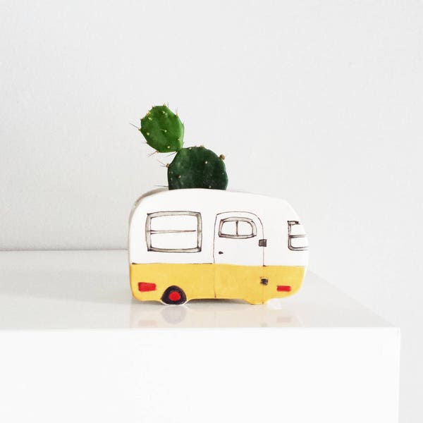 Small yellow  vintage camper planter
