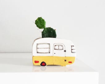 Small yellow  vintage camper planter