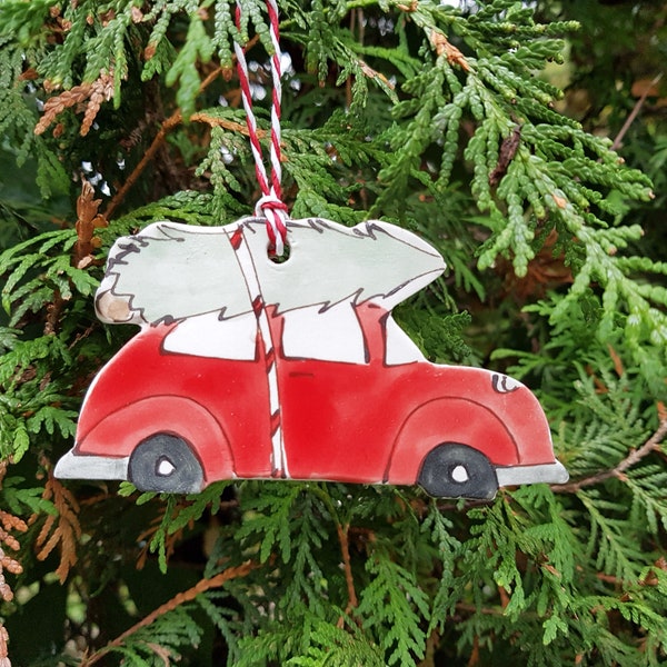 Handmade Christmas ornament. Hand free paint red vintage bug with Christmas tree. Unique ceramic Christmas ornament. Christmas decoration