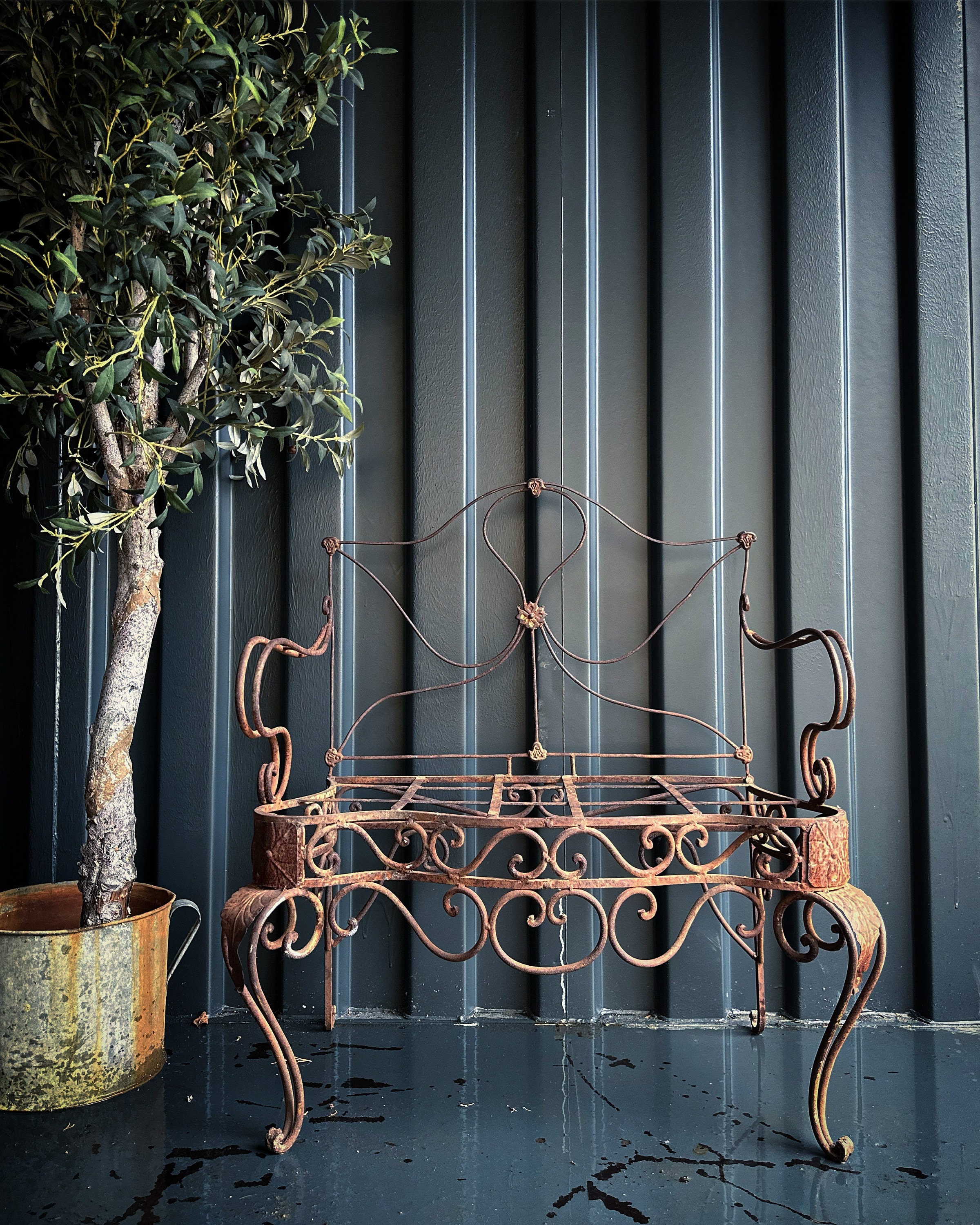 Used wrought iron bench deals