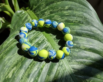 DEEZ BEADZ Neon Green and Blue Glow in the Dark Swirl Average Length Handmade Clay Bead Boho Tie Dye Rave Hippie Stacking Stretch Bracelet