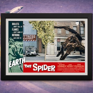 May include: Framed movie poster for "Earth vs. The Spider" with a black frame. The poster features a giant spider, a vintage car, and text that reads "Bullets won't kill it! Flames can't burn it! Nothing can stop it!"