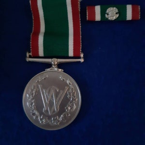 Women&#39;s Voluntary Service Medal circa 1961, with original packaging and paperwork