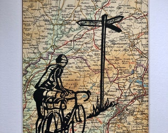 Cyclist linocut prints on vintage Bartholomew’s maps, Cheshire, Lancashire & N. Yorks.