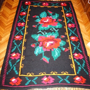 Authentic 50+ Year Old Romanian Kilim Rug – Handmade from Wool and Cotton Warp, Black Background with Vivid Floral Patterns