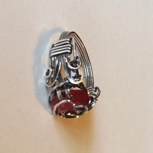 Beautiful Lab created ruby, 12x8mm, is wrapped in sterling silver with antique patina. Prong setting has heart motif in silver. Size 9 1/2 image 3