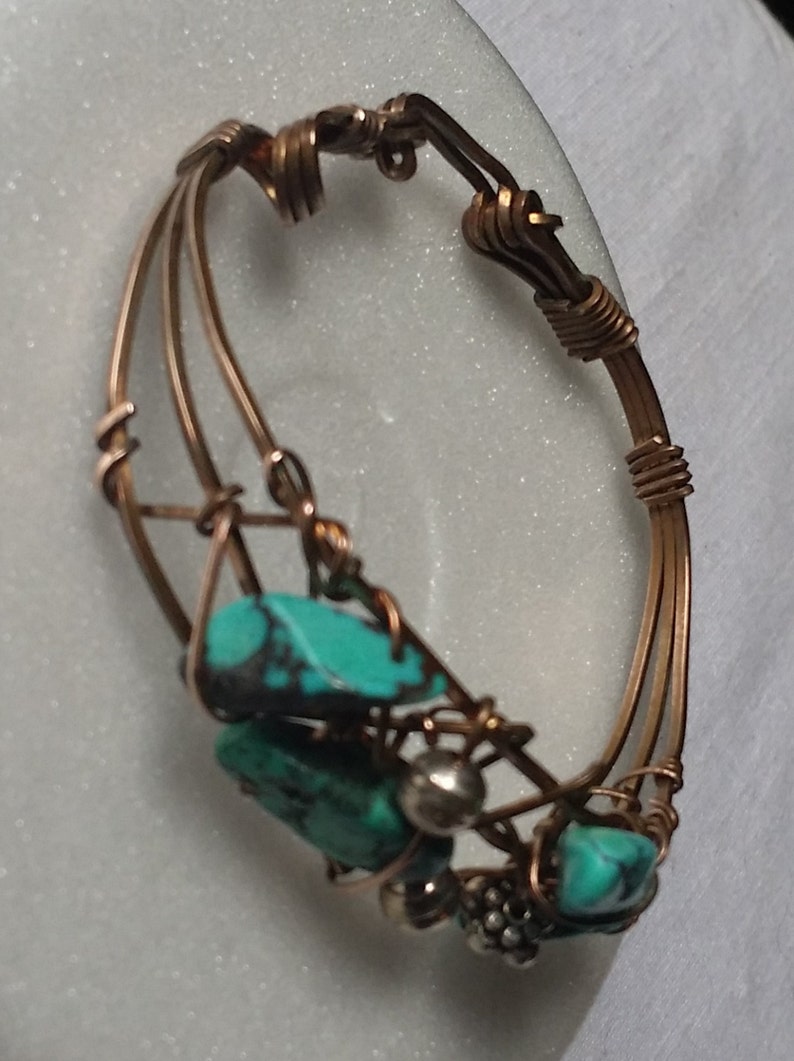 Bronze bracelet cuff wrapping turquoise beads for a stylish look. Fits Medium wrist. image 4