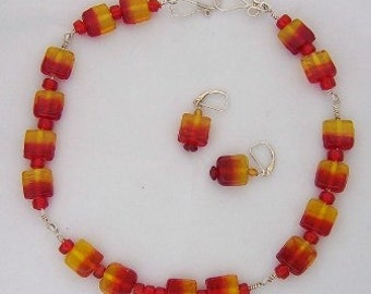 Brighten up your summer with this Choker necklace and earring set. The square glass beads are a red/yellow. Necklace 18 inches.