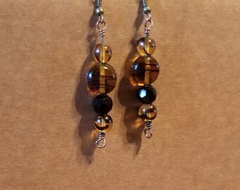 Czech glass beads with opaque black crystals make a tailored drop earring.  Built with red bronze wire and bronze finished earwires.