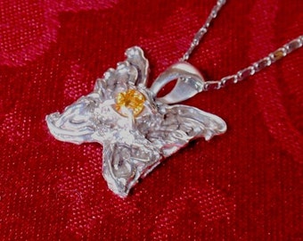 Heavy Hand carved Precious Metal clay (pure silver).  A butterfly with a 6mm round natural Mandarin garnet.
