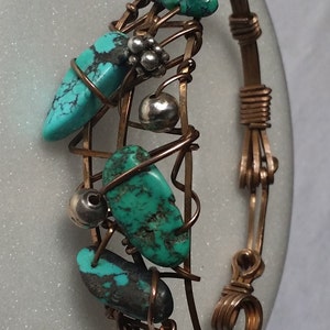 Bronze bracelet cuff wrapping turquoise beads for a stylish look. Fits Medium wrist. image 2