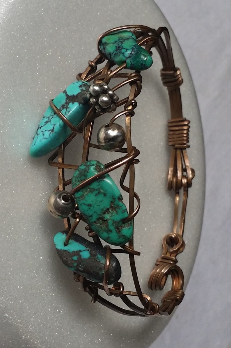 Bronze bracelet cuff wrapping turquoise beads for a stylish look. Fits Medium wrist. image 2