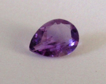 Outstanding faceted Amethyst is pear cut  8x6mm. just under 1 ct.