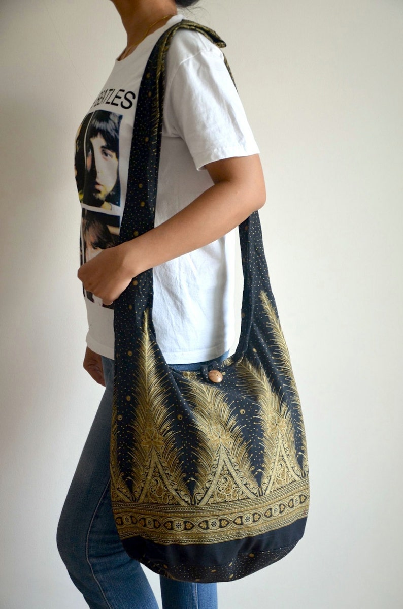 black and gold sling bag