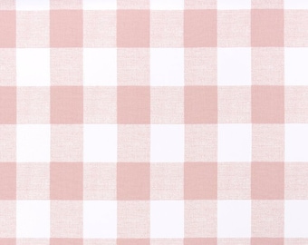 May include: Pink and white gingham fabric with a subtle texture. The fabric is shown on a measuring tape with inches marked.