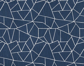 May include: A navy blue fabric with a white geometric pattern of overlapping triangles and lines.