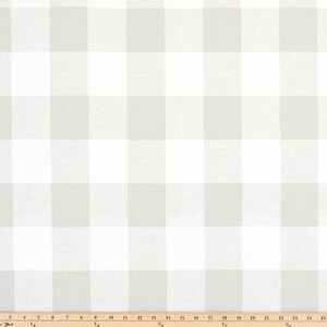 May include: White and gray gingham fabric with a 1-inch check pattern. The fabric is shown with a ruler for scale.