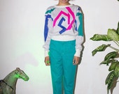 bright mint green vintage high waisted jeans.1990s