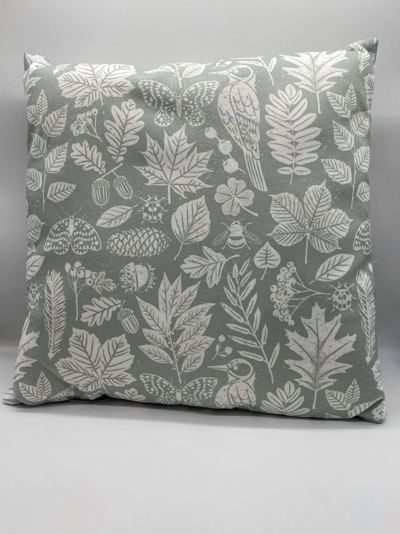 Grey cushion with garden pattern Etsy
