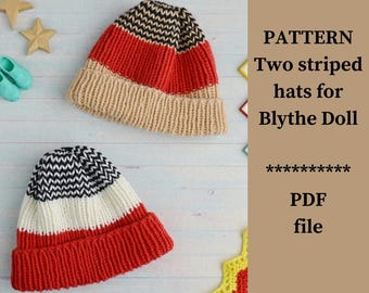 May include: Two striped knit hats in red, beige, and black and white. The hats are designed for a Blythe doll. The image also includes the text "PATTERN Two striped hats for Blythe Doll PDF file."