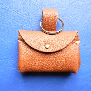 Keychain or brown leather bag decoration