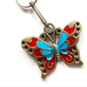 Borboleta charme zíper extrator ajudante cadarço rolo skate rave pingente moldura de metal cor latão antigo com coloração laca