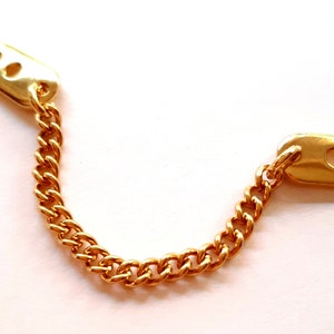 Metal hanger to sew on for fur coats or jackets to choose from in the colors SMOKE GOLD SILVER Gold