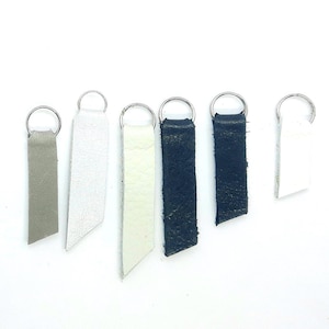 CUERO genuino Tonos Negro, Blanco, Gris / Plateado Puller-Aid Tirador de cremallera Bolsos Carteras Carteras Chaquetas Anillo de metal plateado