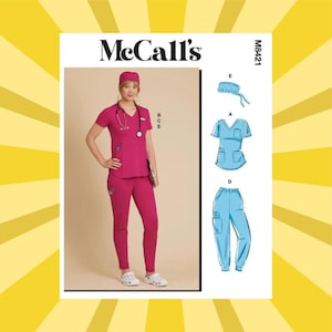 May include: McCall's pattern for a medical scrub set. The image shows a woman wearing a pink scrub set, including a cap, top, and trousers. The pattern also includes illustrations of a blue scrub set. The pattern number is M8421.