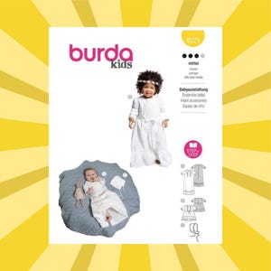 May include: A white Burda Kids sewing pattern for baby outfits. The pattern includes images of a baby in a white dress and a baby lying on a blue quilted mat. The text on the pattern reads "Babyausstattung" and "Infant accessories."