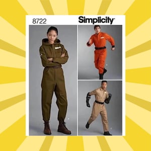 May include: Simplicity sewing pattern 8722 featuring three different jumpsuits in olive green, orange, and tan. The olive green jumpsuit has a hood and belt. The orange and tan jumpsuits have belts and are shown in action poses.