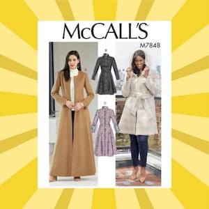 May include: McCALL'S M7848 sewing pattern envelope featuring three coat designs. One is a long tan coat, another is a dark patterned coat, and the third is a light-colored plaid coat with a belt. The text MCCALL'S and M7848 are clearly visible.