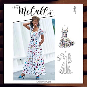 May include: McCall's sewing pattern M8177 for a dress with three different styles. The pattern includes a long dress with a square neckline and puff sleeves, a short dress with a square neckline and puff sleeves, and a short dress with spaghetti straps. The dress is shown in a white and colorful floral print.
