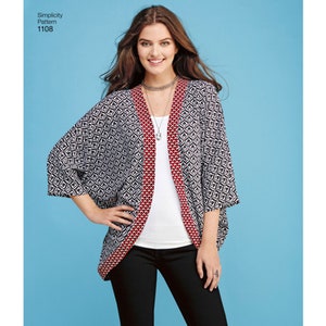 May include: A Simplicity Pattern 1108 kimono-style cardigan featuring a black and white geometric diamond pattern with a contrasting red and white patterned border along the front opening and wide, loose-fitting three-quarter length sleeves.