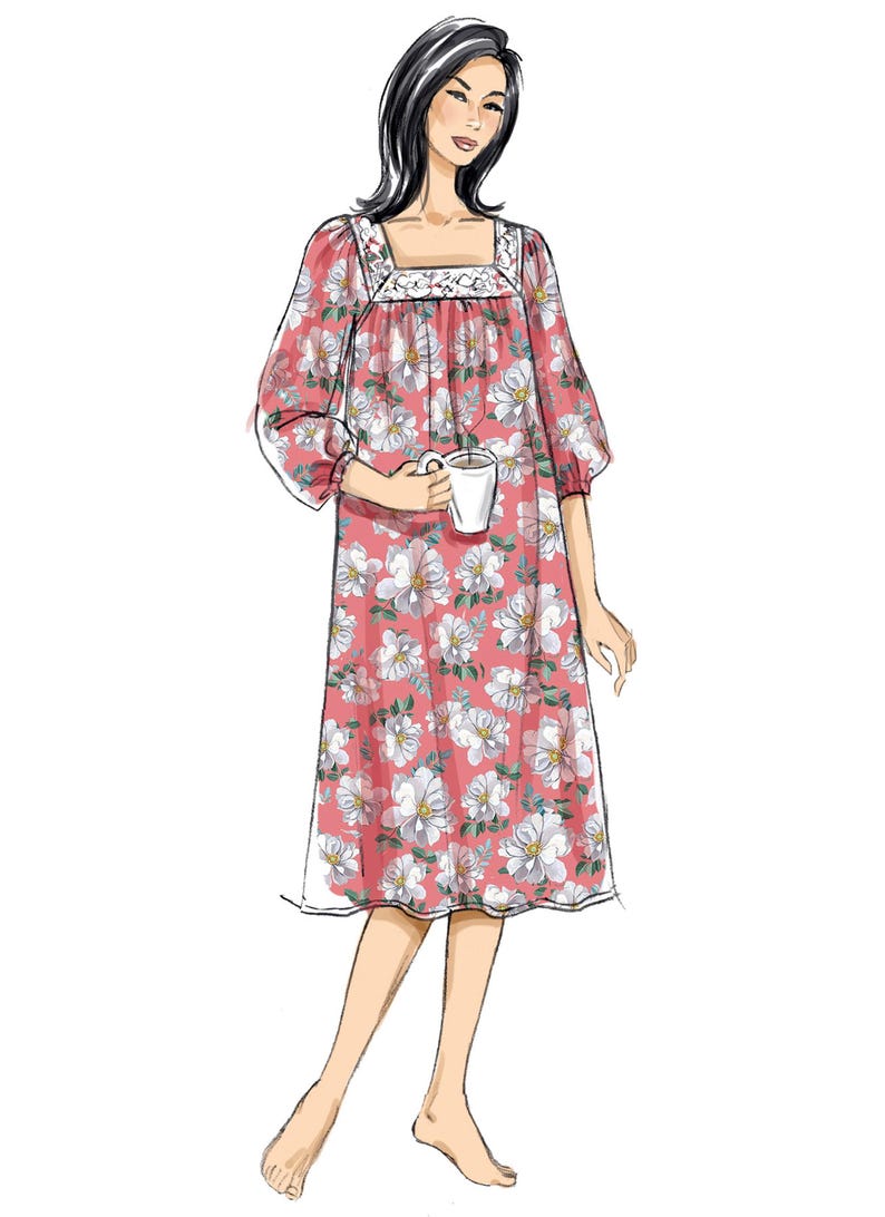 May include: A pink floral nightdress featuring white flowers. The square neckline is trimmed with lace. The three-quarter sleeves and mid-calf length create a comfortable silhouette. A woman is holding a white mug. The nightdress is a comfortable design.