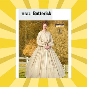 May include: A vintage Butterick sewing pattern, B5831, featuring a woman in a cream-colored historical dress. The dress has long sleeves, a fitted bodice, and a full skirt. The background shows a white fence and autumn foliage.