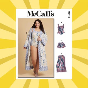 May include: McCall's sewing pattern M8412 featuring a woman wearing a floral print swimsuit and robe. The pattern includes a swimsuit, shorts, and wide-leg pants. The pattern is displayed on a white background with a yellow and white striped border.
