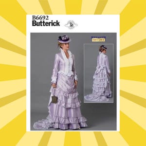 May include: A sewing pattern for a historical dress, featuring a lilac-colored gown with a ruffled skirt and a matching jacket. The pattern includes a smaller image of the dress from the back. The pattern is labeled "B6692 Butterick".