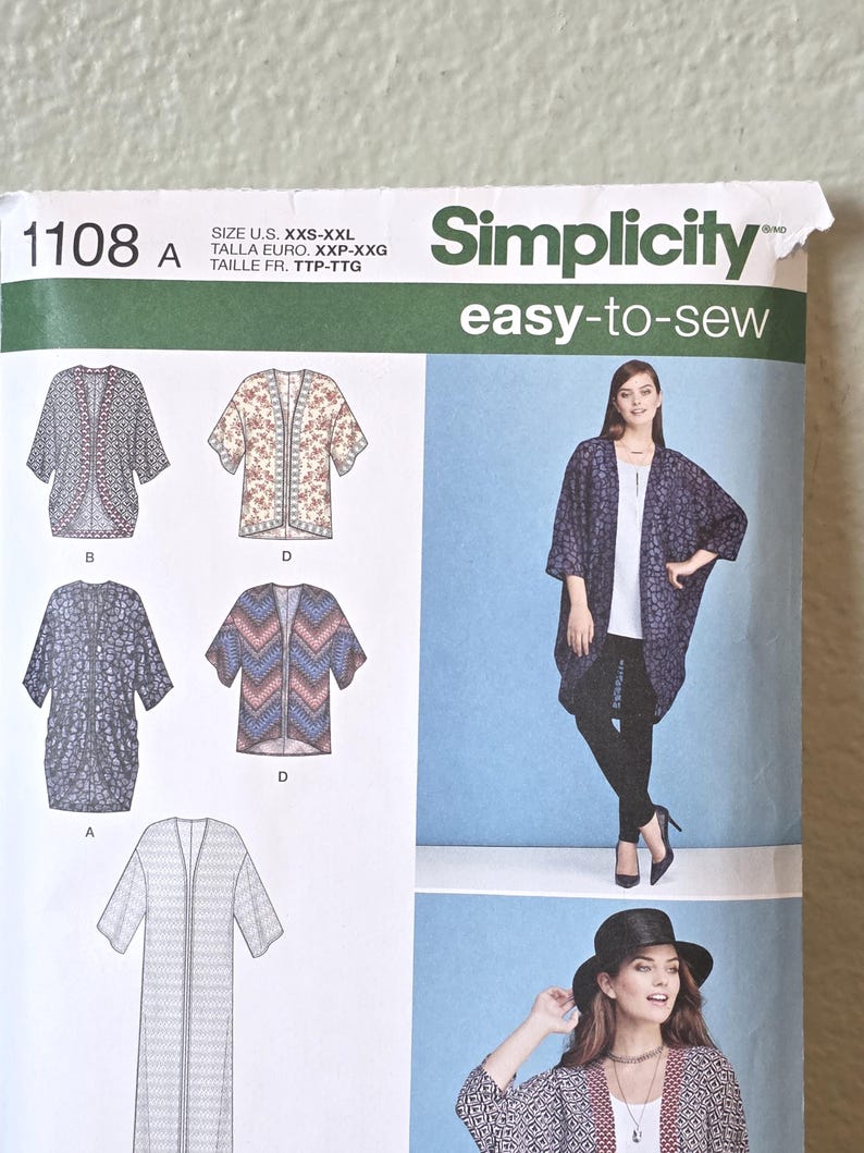 May include: A Simplicity 1108 easy-to-sew pattern envelope for a loose-fitting kimono-style cardigan. The cover displays technical line drawings of four variations and photographs of the garment in different prints, including floral and geometric patterns.