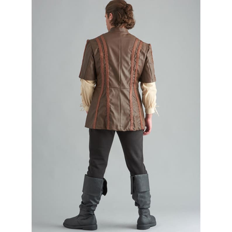 May include: A brown faux leather short-sleeved jacket with decorative stitching, paired with black trousers and grey boots. The jacket has a high collar and is worn over a cream-coloured shirt. The outfit is reminiscent of historical or fantasy attire.
