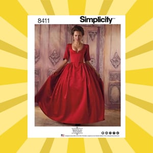 May include: Simplicity pattern 8411 shows a woman in a red ball gown with short sleeves and a low neckline. The pattern's cover displays the dress in a room with ornate wall decorations. The Simplicity logo is at the top.