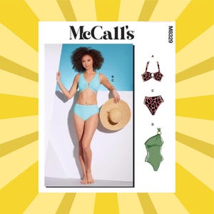 May include: A McCall's sewing pattern package featuring a woman in a light blue bikini holding a straw hat. The package includes illustrations of a bikini with a leopard print, and a one-shoulder swimsuit. The package is labeled with the McCall's logo and the number M8329.